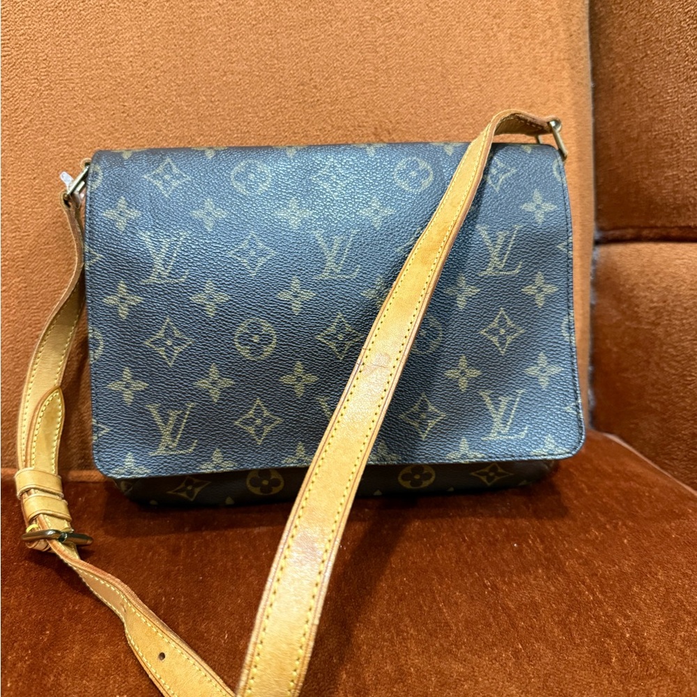 Authentic Louis Vuitton Musette Tango short shoulder Monogram bag.